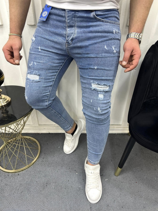 Blugi skinny fit  prespalati albastru deschis cu rupturi [1]