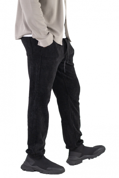 Pantaloni negri din material reiat cu ajustare elastică la gleznă [6]
