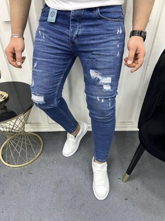 Promotii - Blugi skinny fit albastru denim cu rupturi